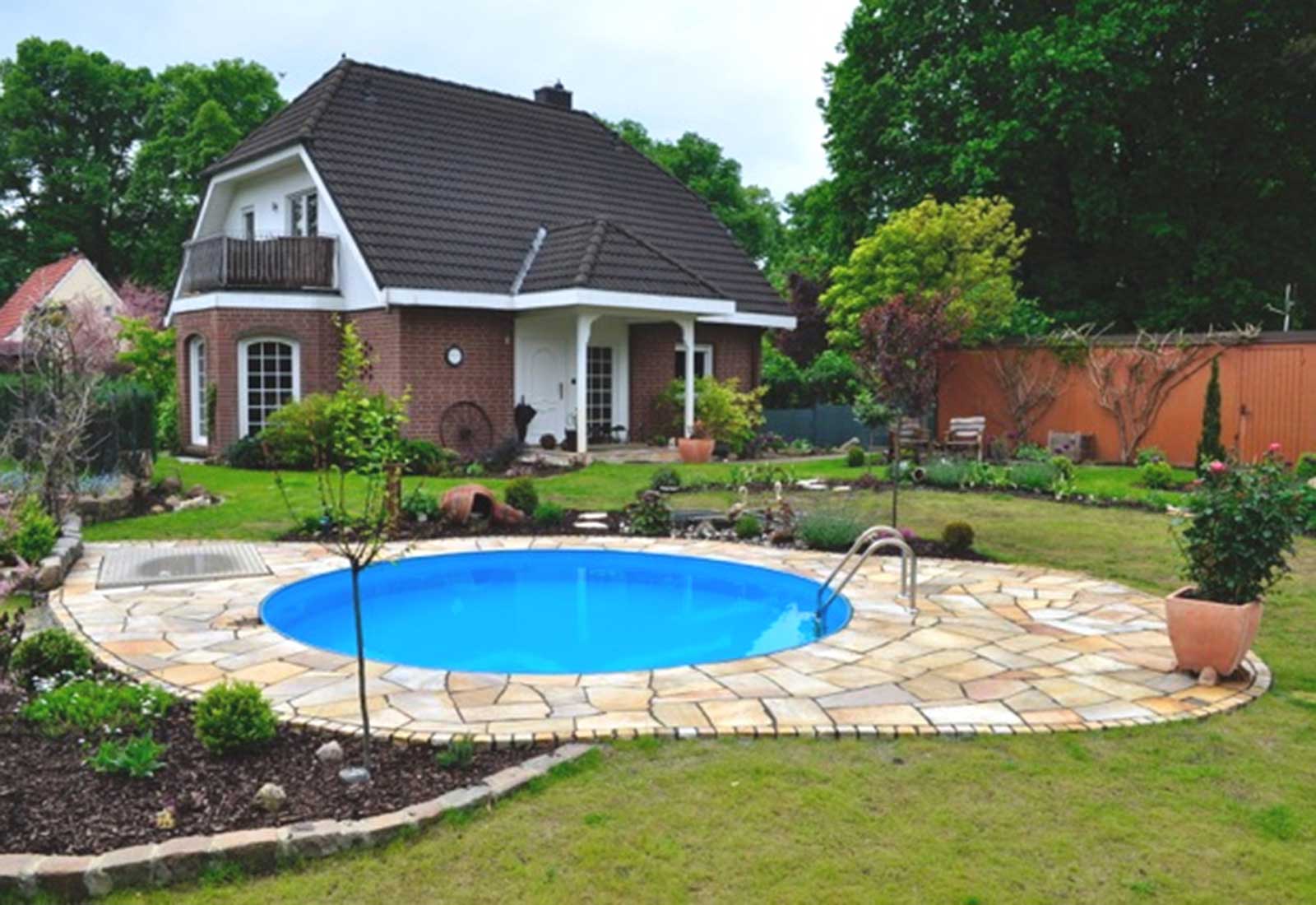 Gepflegtes Einfamilienhaus mit rundem Pool und Garten